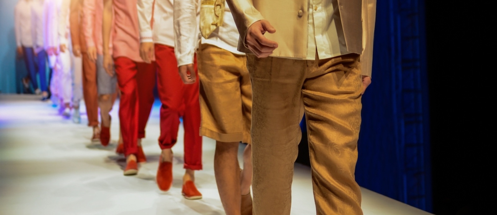 Models walking a runway at a fashion show